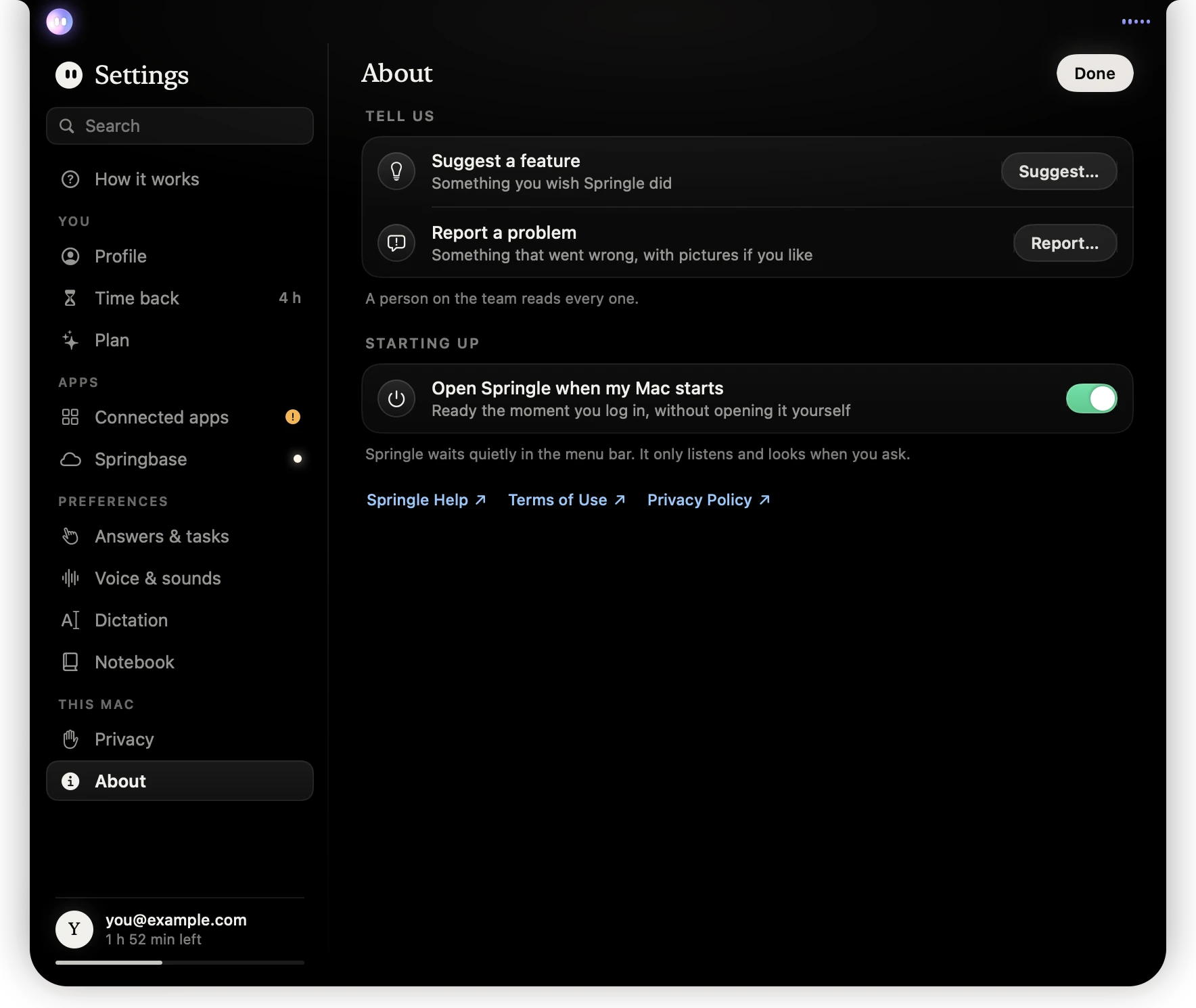 Settings open on About, with Tell us at the top: Suggest a feature with a Suggest button and Report a problem with a Report button, then Starting up